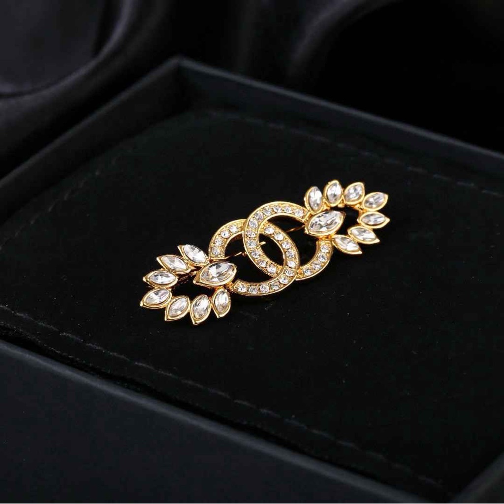 Chanel Gold Tone Crystal Encrusted Leaf Pin
